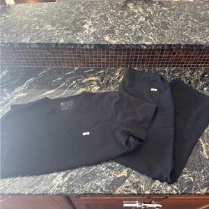 Pair of Men’s size large FIGS scrubs - black